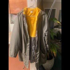 GENTLY WORN —>  Army Green jacket with yellow fur interior